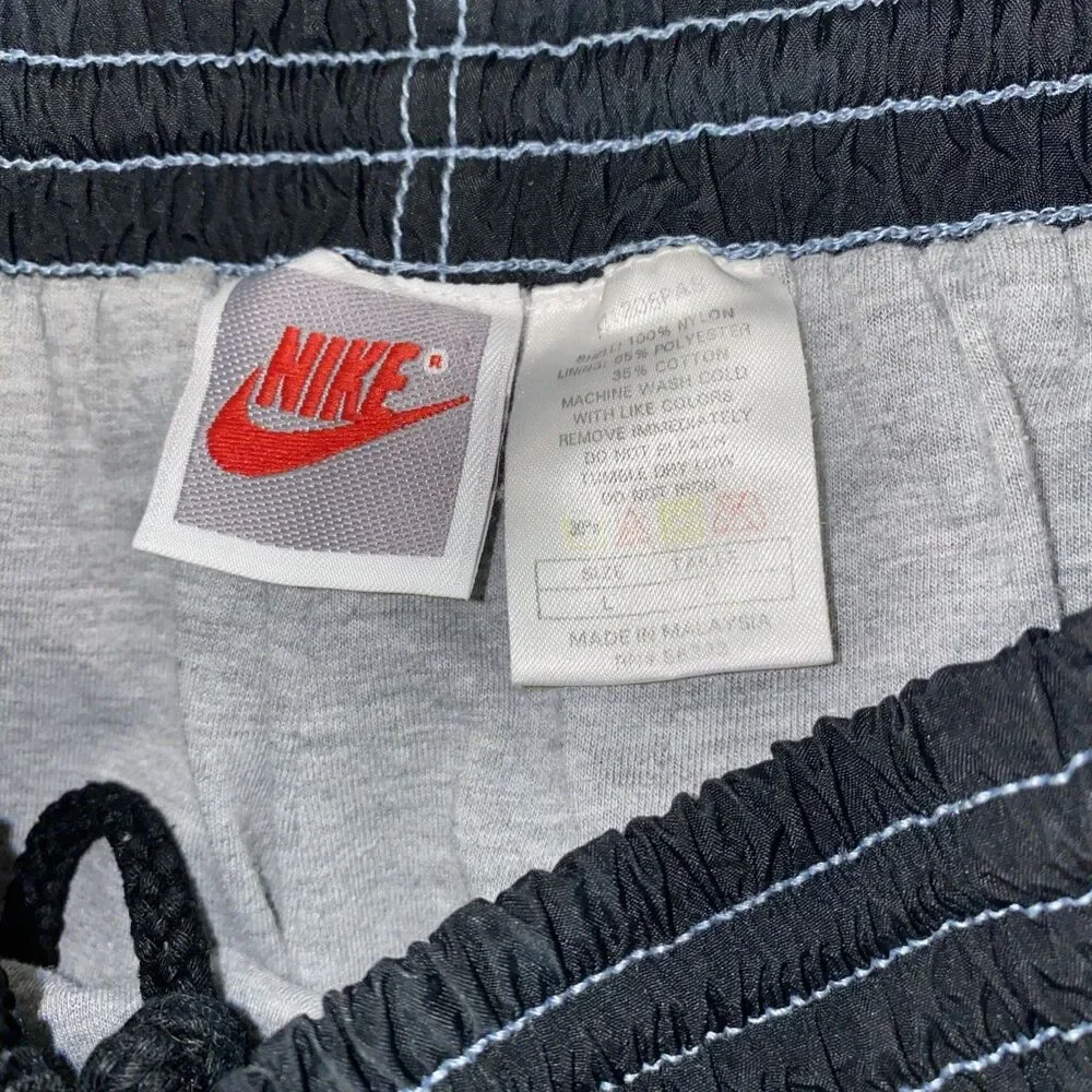 Nike Windbreaker Track Pants Men Large Black Ankle Zip Lined Baggy